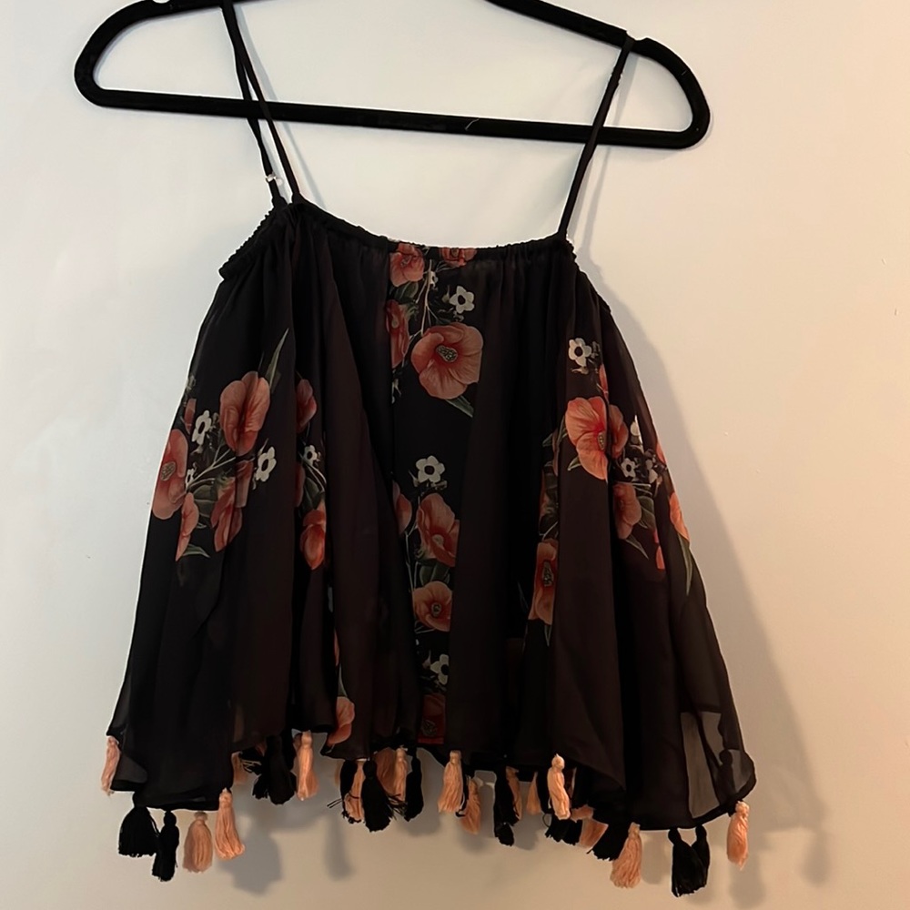 Black and floral print flowy crop top with black and pink tassels